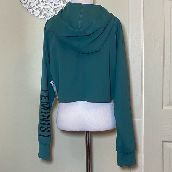 New Balance Full time feminist cropped drawstring hoodie Sample Piece Green - Picture 3 of 7